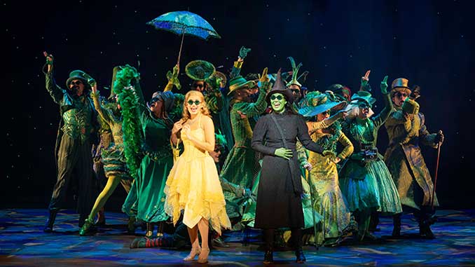 Courtney-Monsma-and-Sheridan-Adams-and-the-Cast-of-Wicked-photo-by-Jeff-Busby