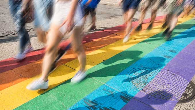 People-walking-on-a-rainbow-footpath