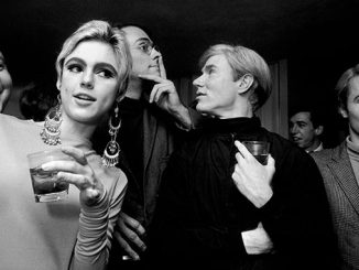 Steve-Schapiro-Edie-Sedgwick,-Andy-Warhol,-and-others-at-a-party-1965